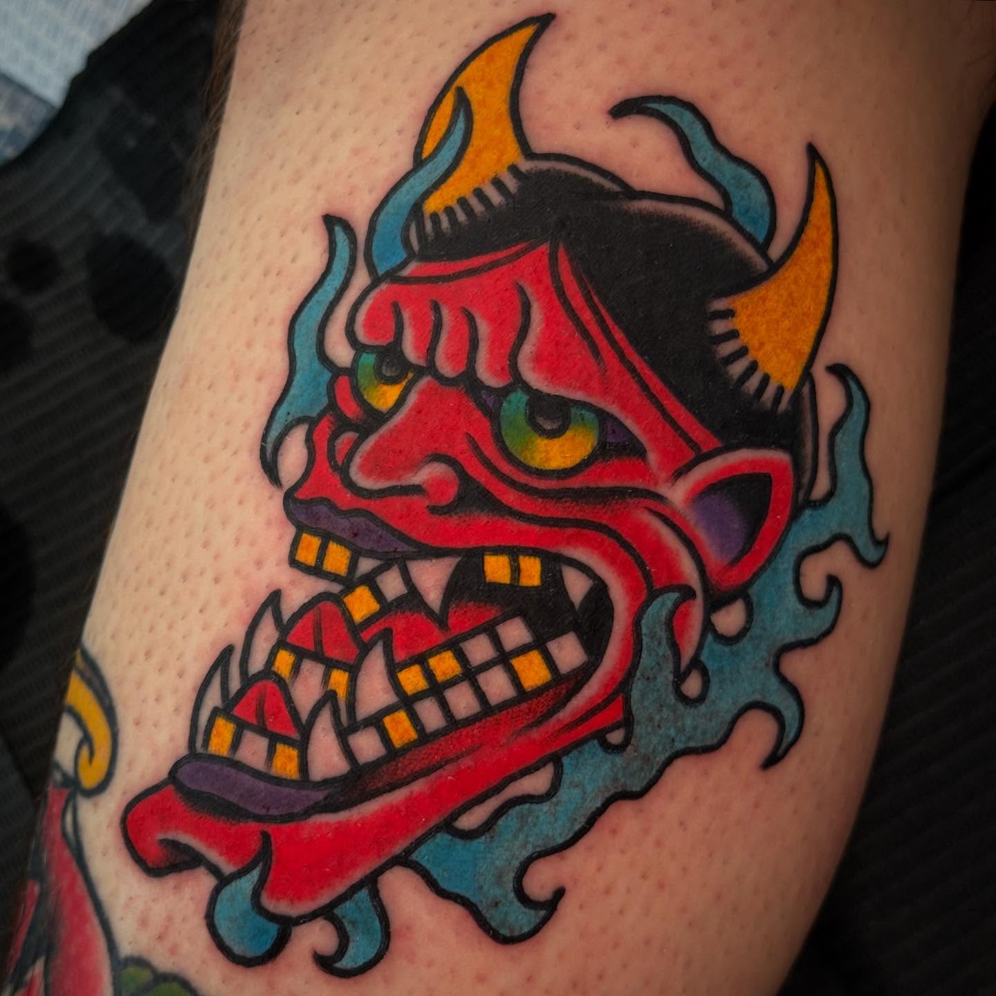 Demon mask American traditional tattoo on the forearm by Big Al