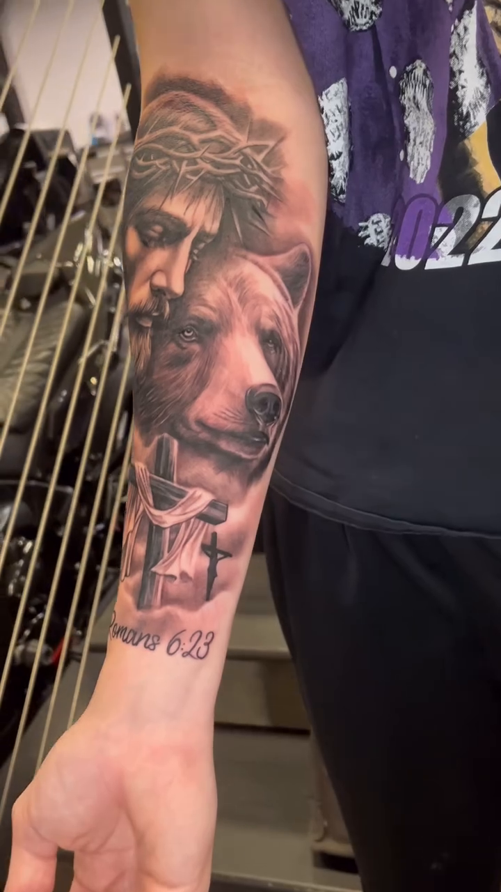 Jesus and a lamb realism tattoo by Jesse Frausto