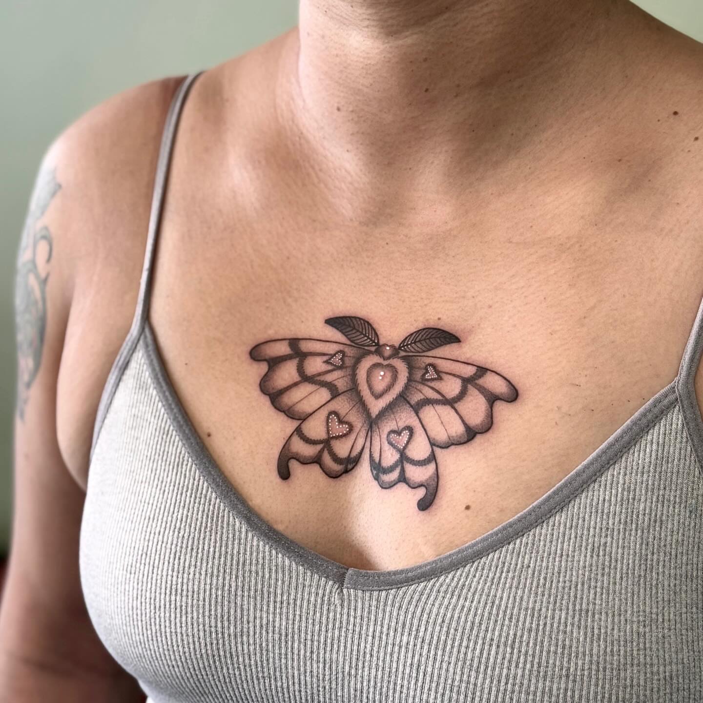Butterfly black and grey tattoo on the chest by Taylor Elizabeth 🕉️
