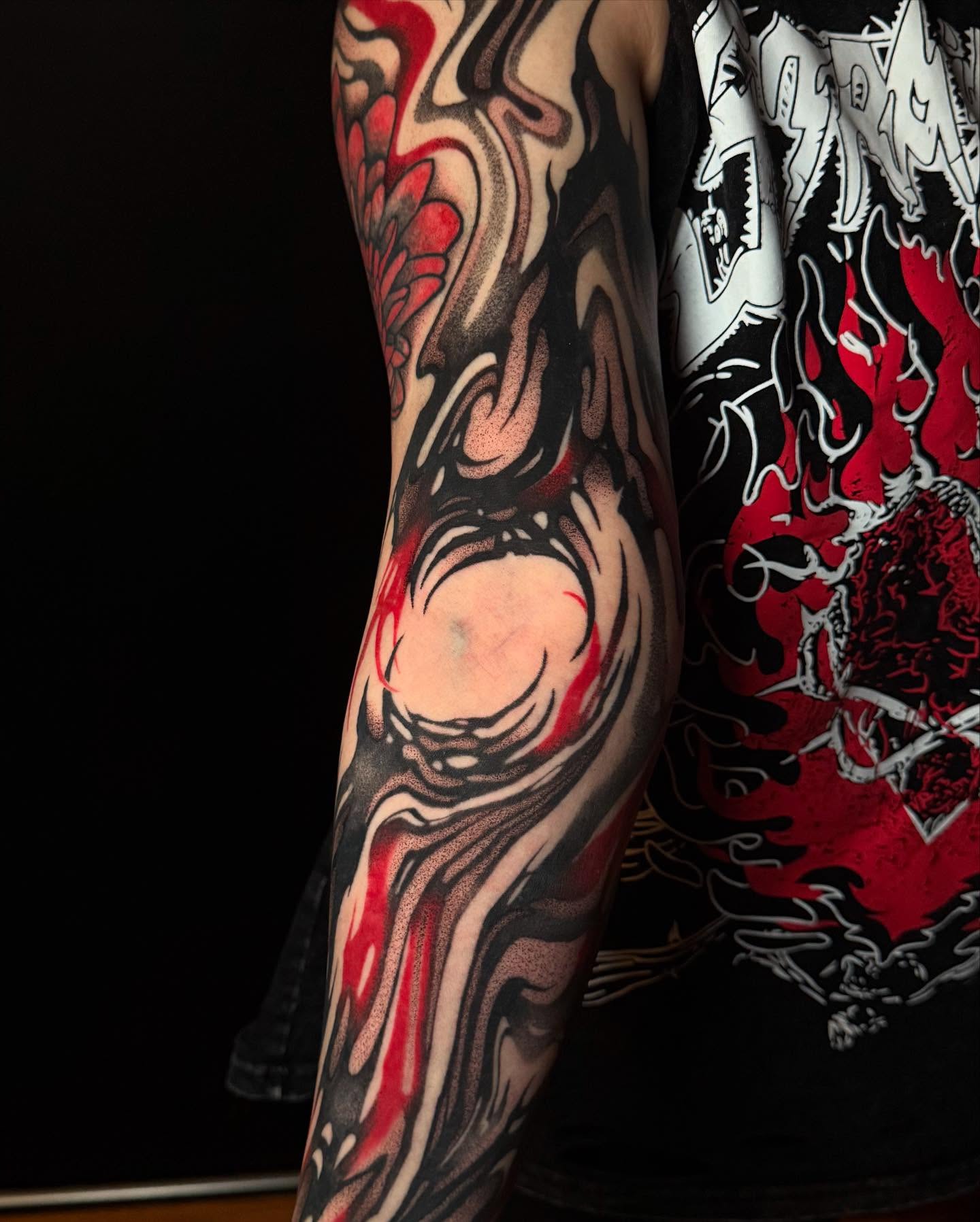 Abstract swirl dotwork tattoo on the forearm by Dylan Orbock, Berkeley, California