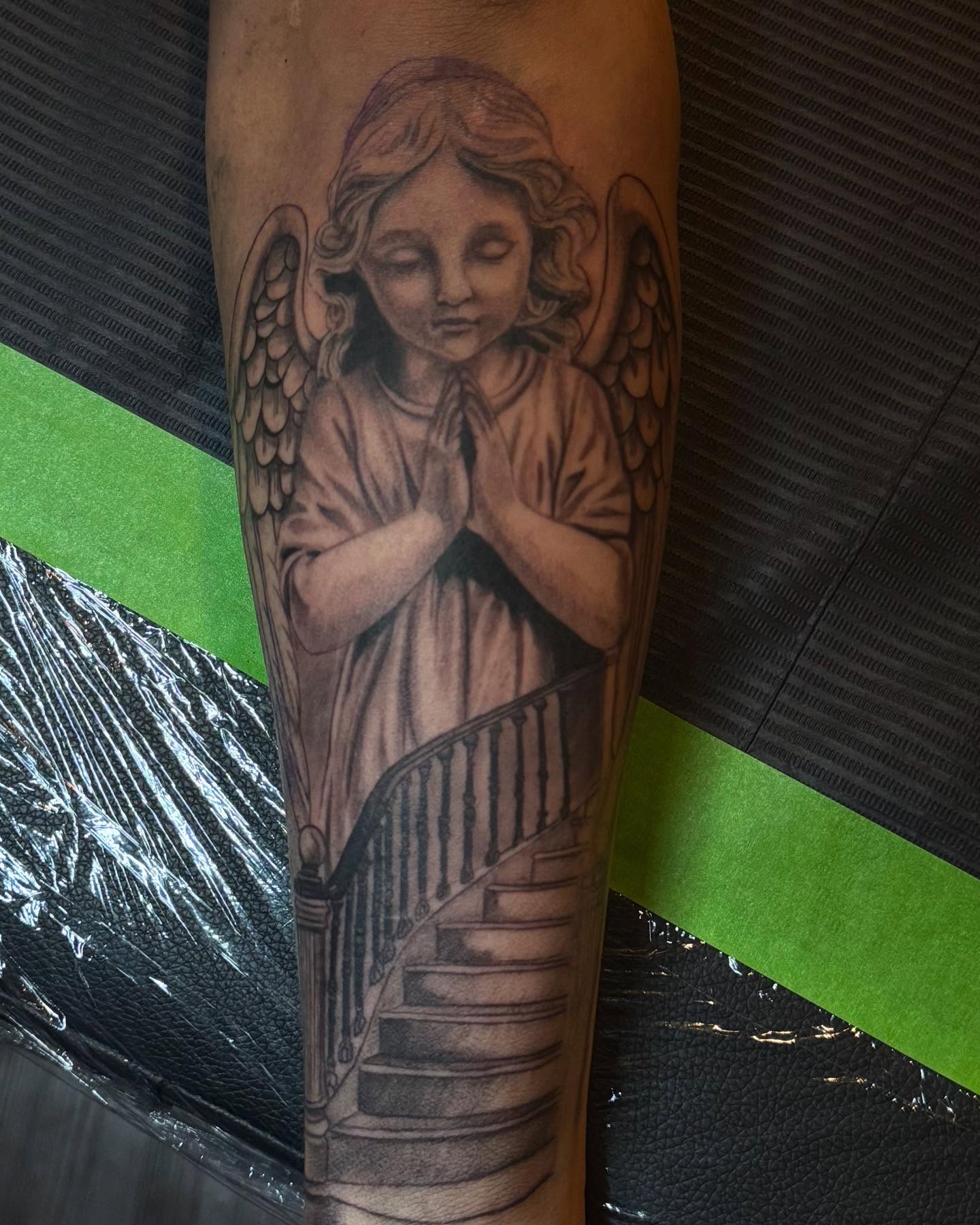 Tattoo by @elian.tattoos — black_and_grey, realism
