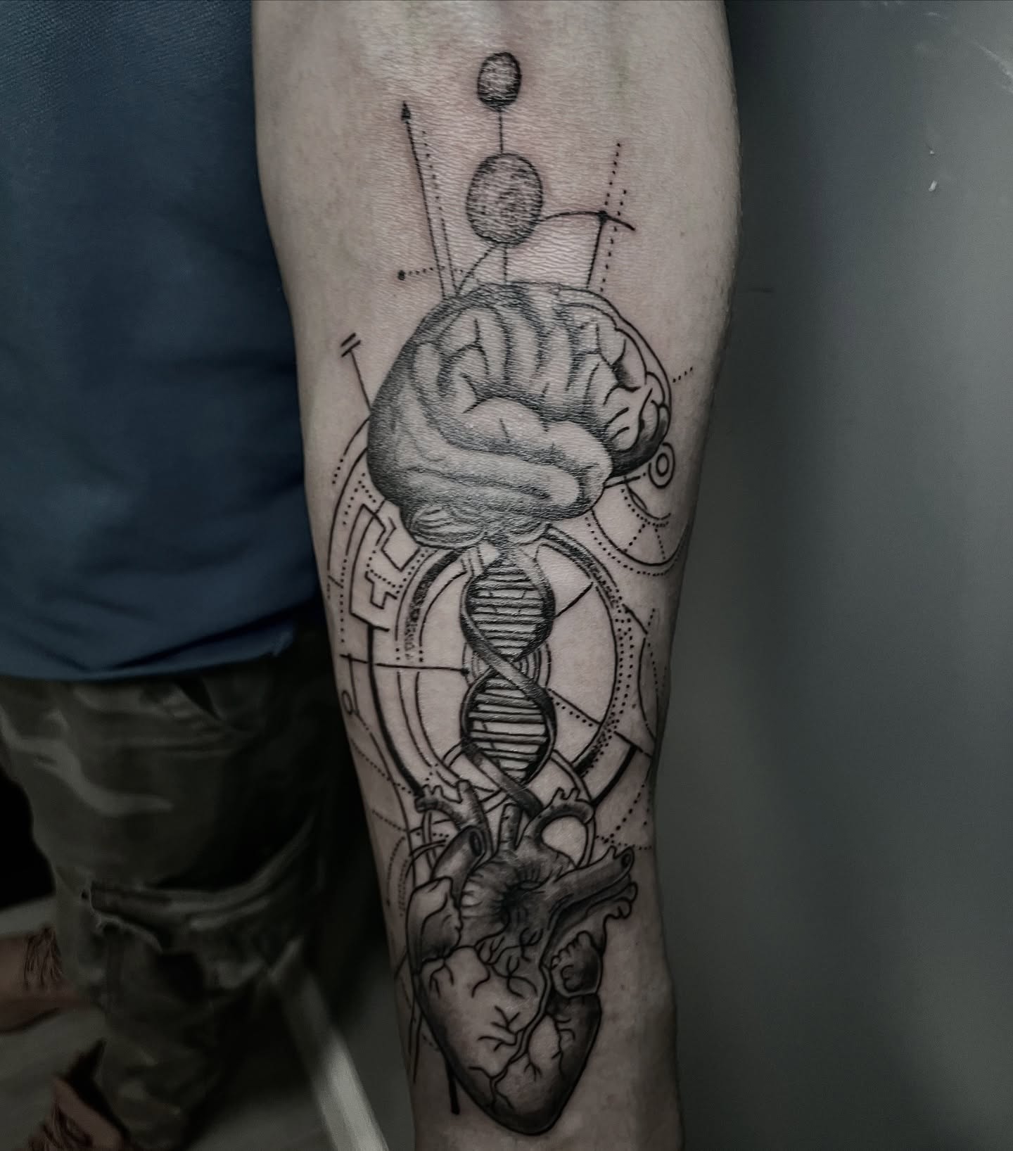 Brain, DNA strand, heart geometric tattoo on the forearm by La Doña’s Tinta 🖋️, Lynn, Massachusetts