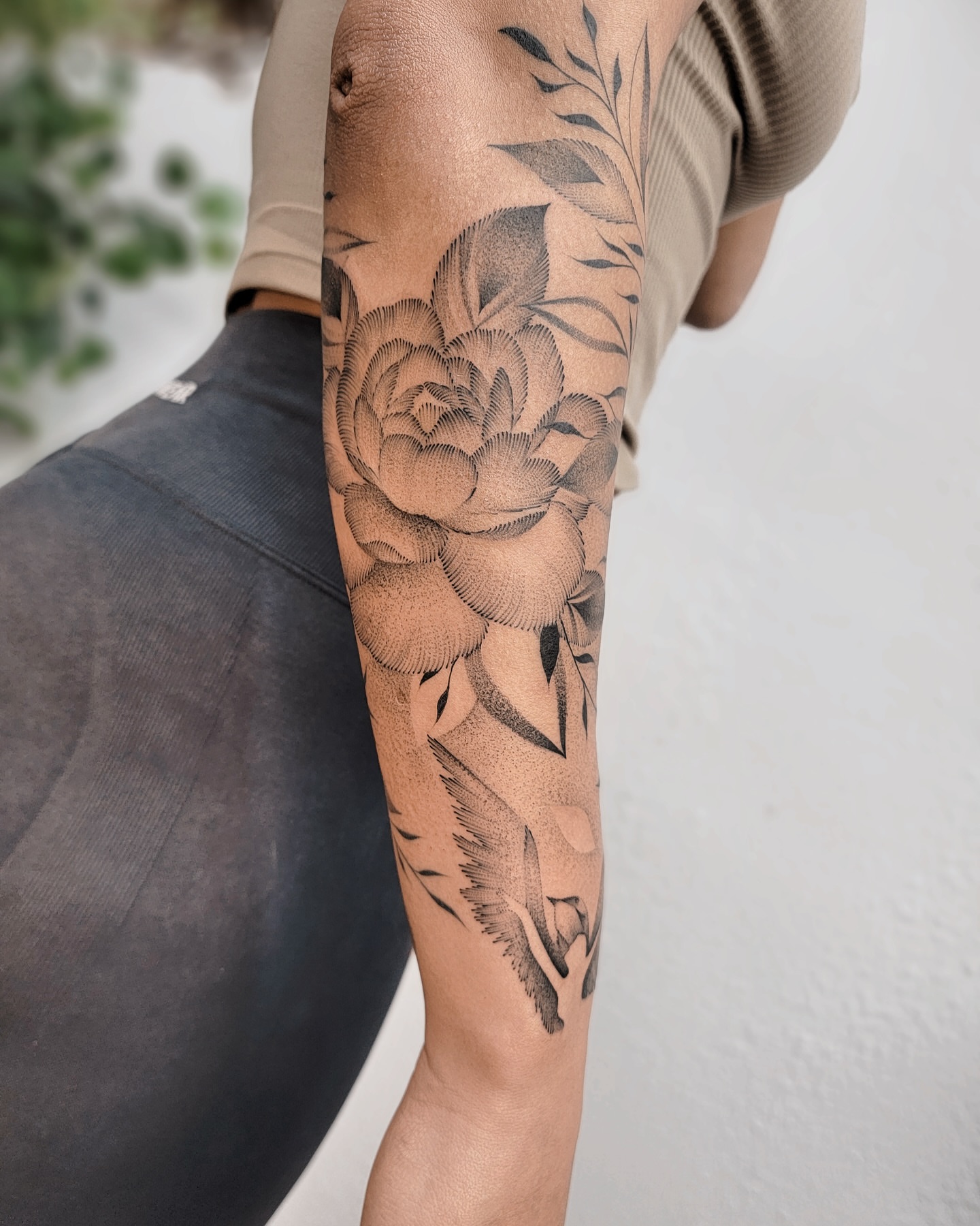 Peony black and grey tattoo on the forearm by Houston Tattoo Artist