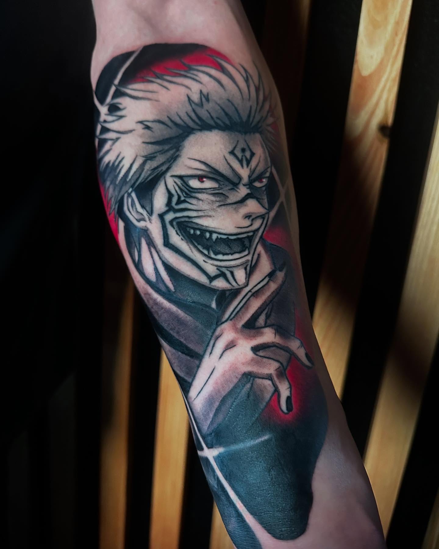 Anime character anime tattoo on the forearm by Alfred