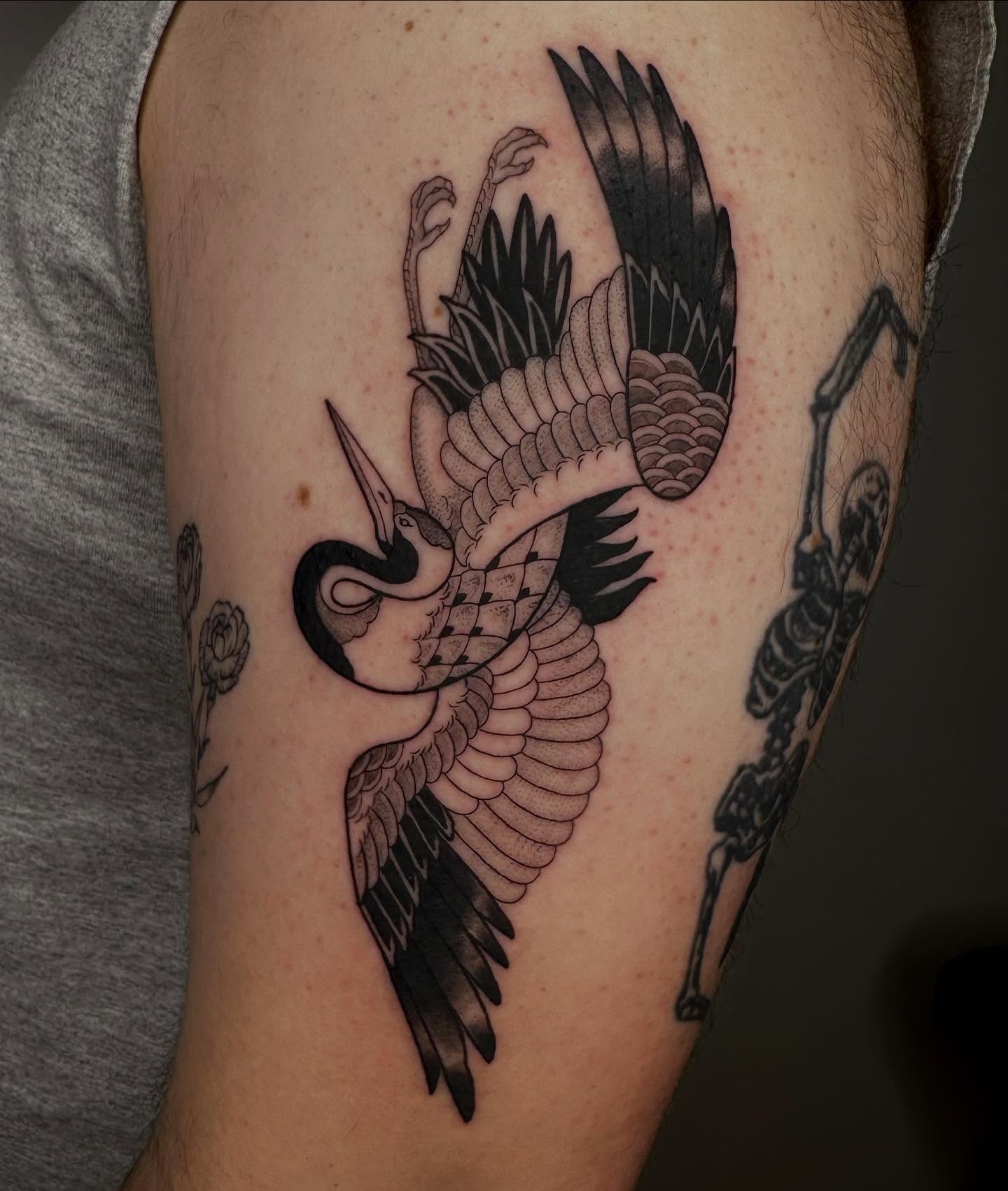 Cranes black and grey tattoo on the forearm by Son Salem