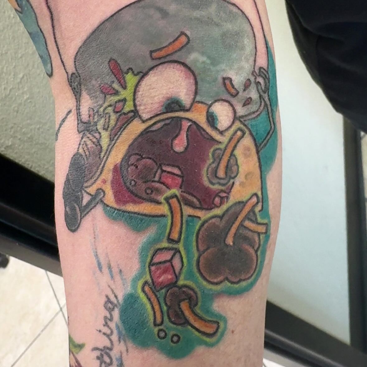 Abstract food new school tattoo on the forearm by Columbus Tattoo Artist