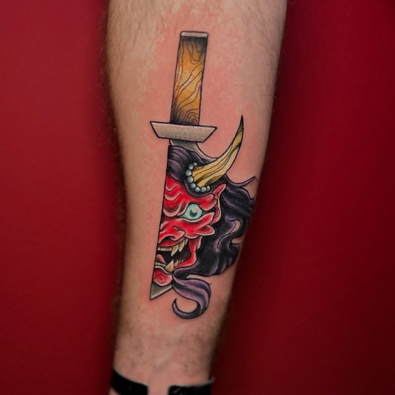 Demon mask and katana japanese irezumi tattoo on the forearm by Abby Watts, Columbus, Ohio