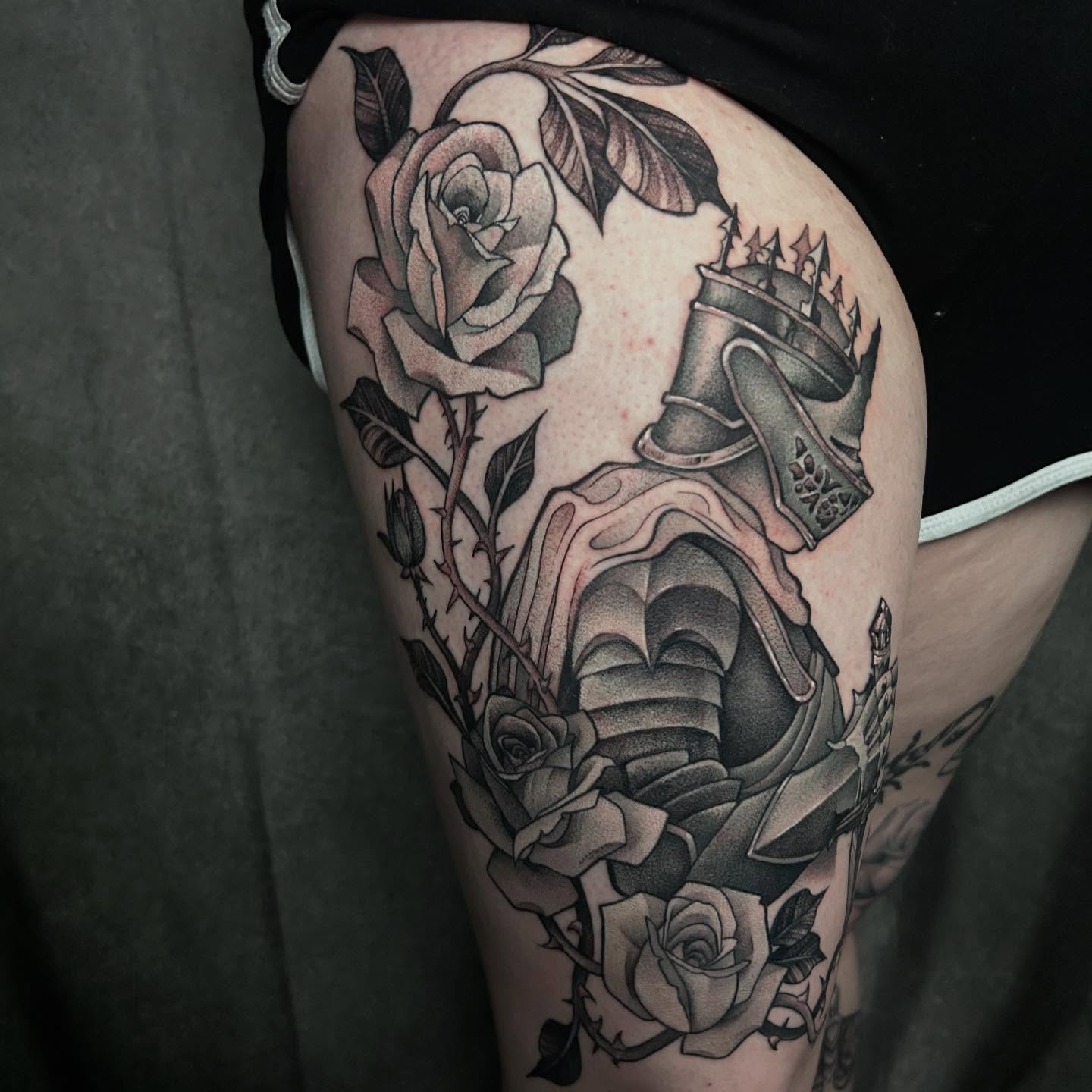Roses and knight helmet realism tattoo on the thigh by ♡︎ Kaylie ♡︎, Tacoma, Washington