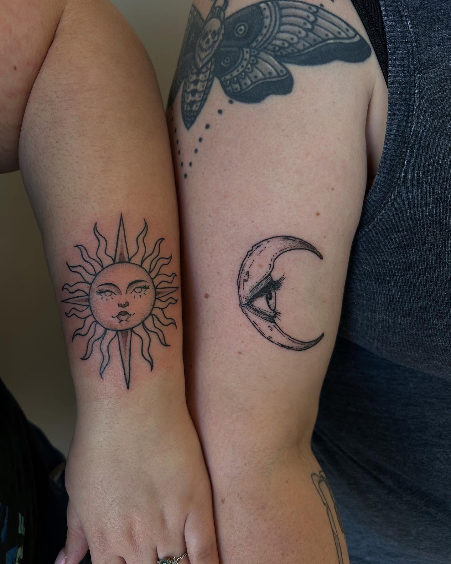 Sun and moon dotwork tattoo on the forearm by 𝕯𝖆𝖓𝖎