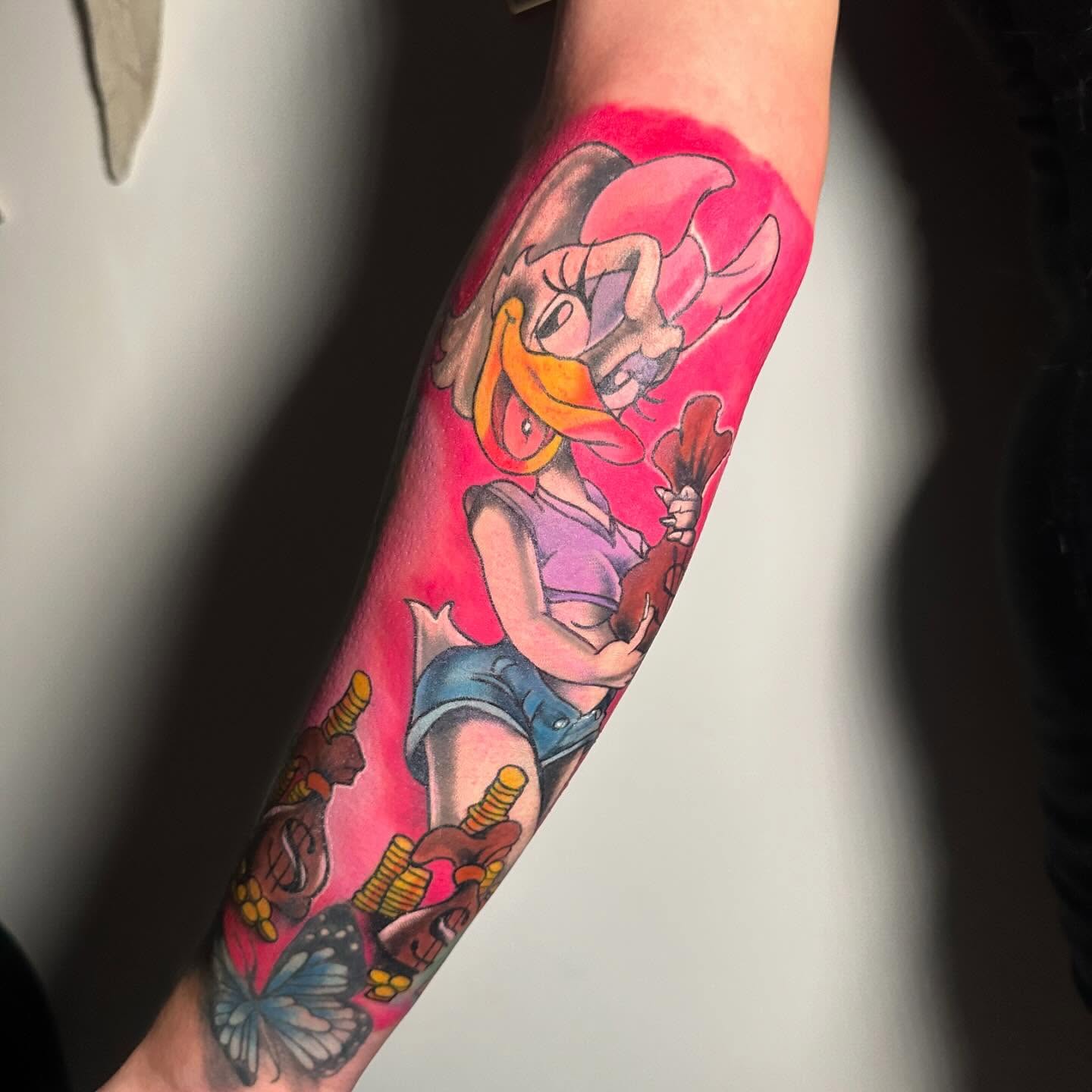 Duck character new school tattoo on the forearm by Anghel Patricia
