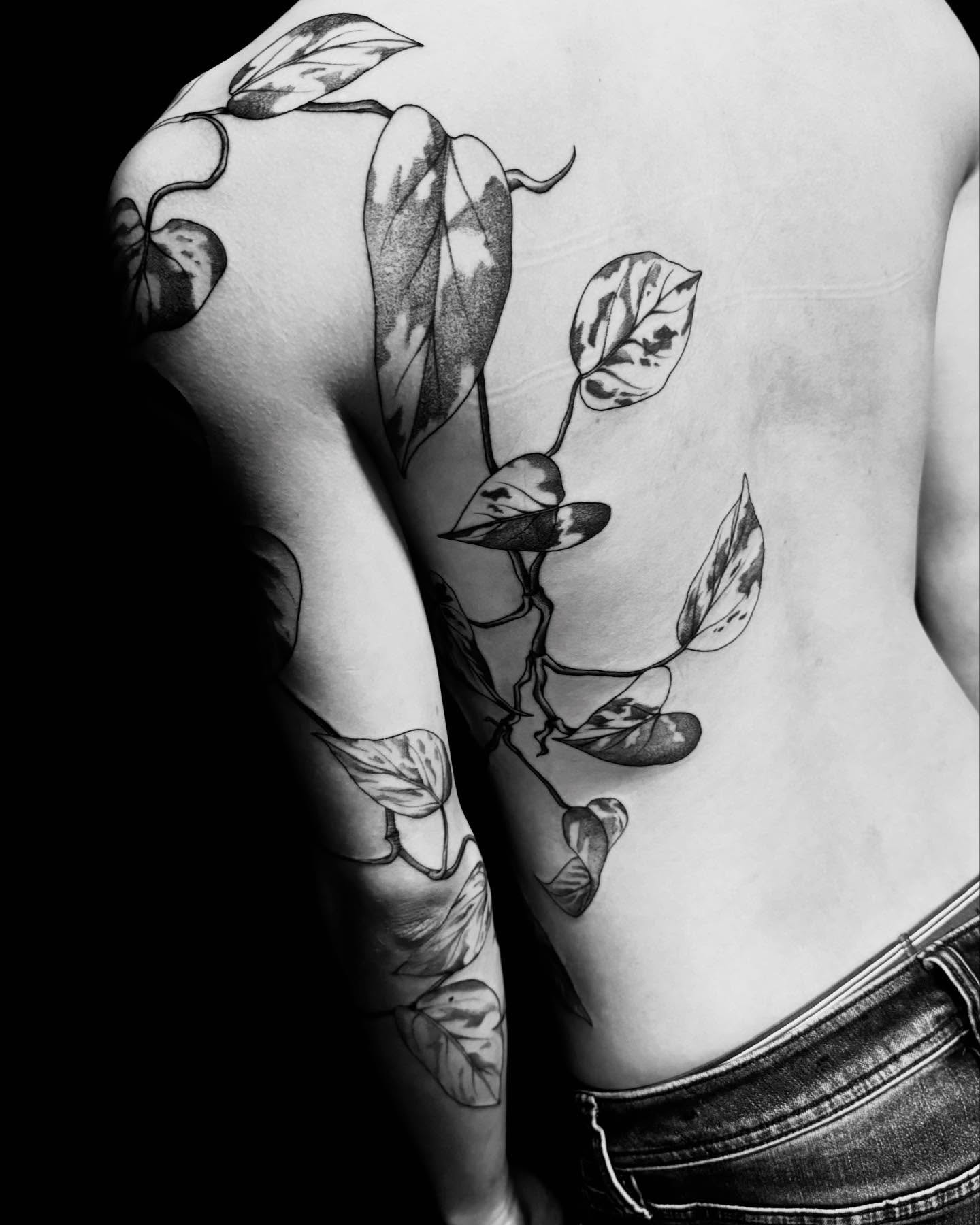 Leafy vine black and grey tattoo on the back by Amber Starr, Midvale, Utah