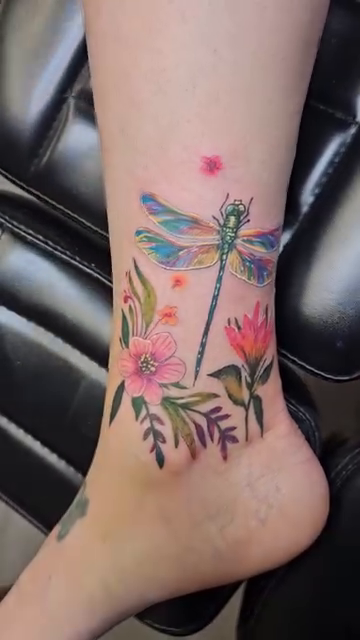 Dragonfly and flowers watercolor tattoo by Zac Pedrosa