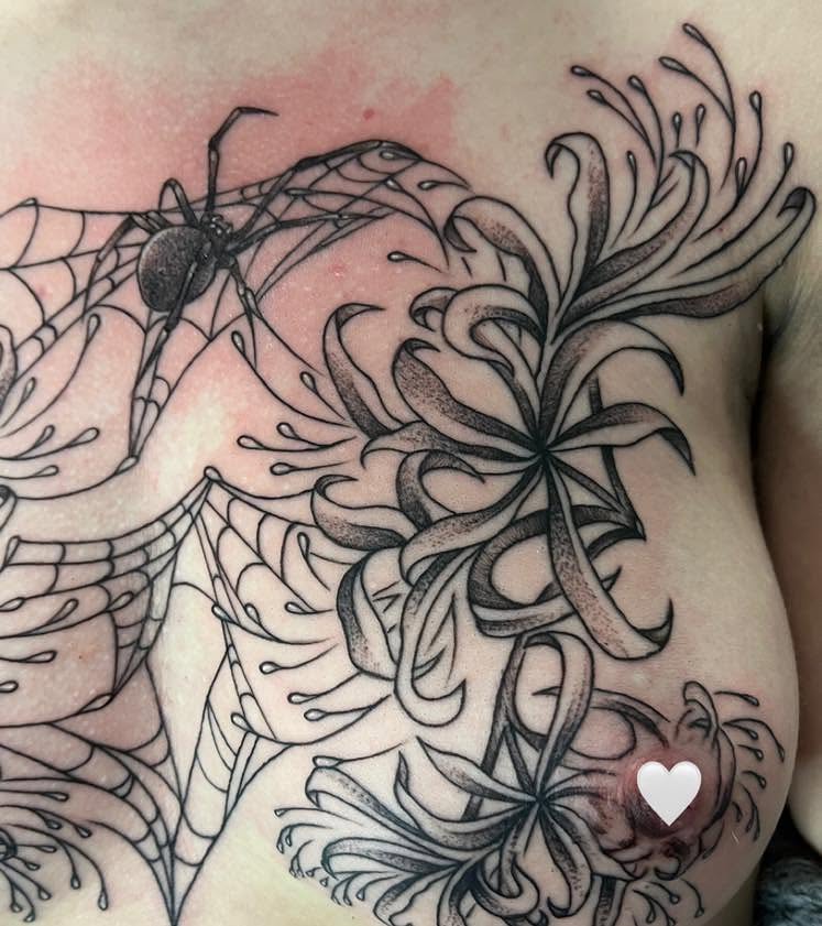 Spider and flowers black and grey tattoo on the shoulder by Destiny A