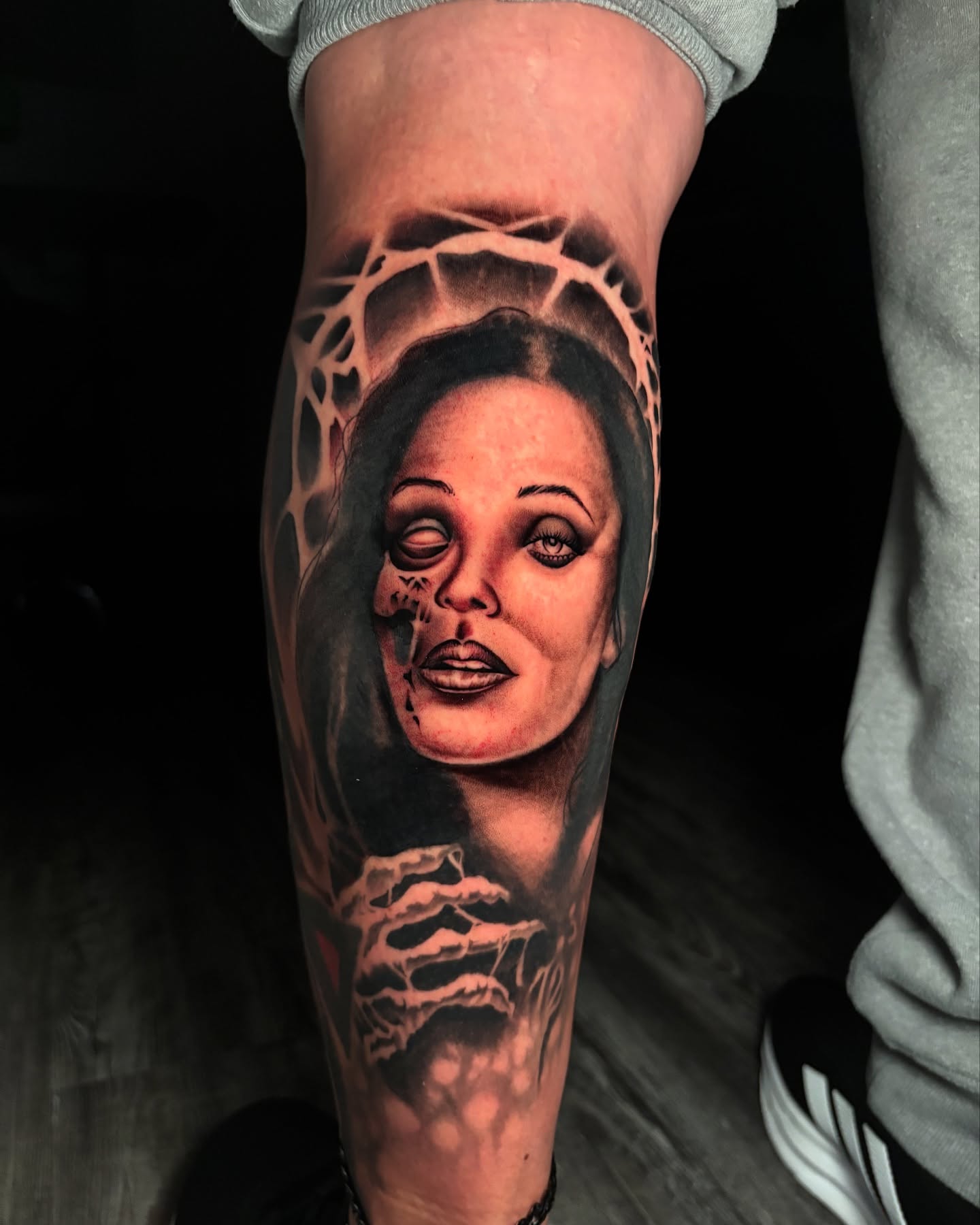 Woman's face realism tattoo on the forearm by Eric Garcia