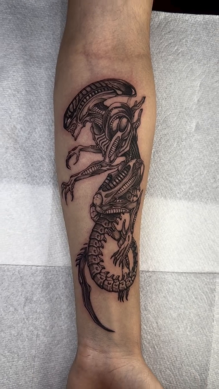 Alien creature realism tattoo by taline