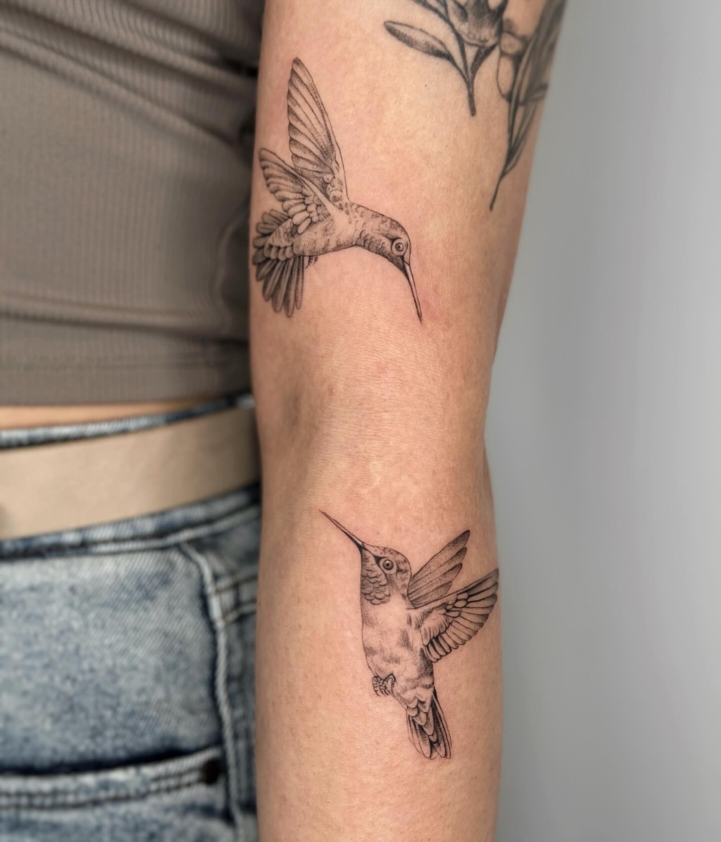 Hummingbird black and grey tattoo on the forearm by Alyssa . Villela
