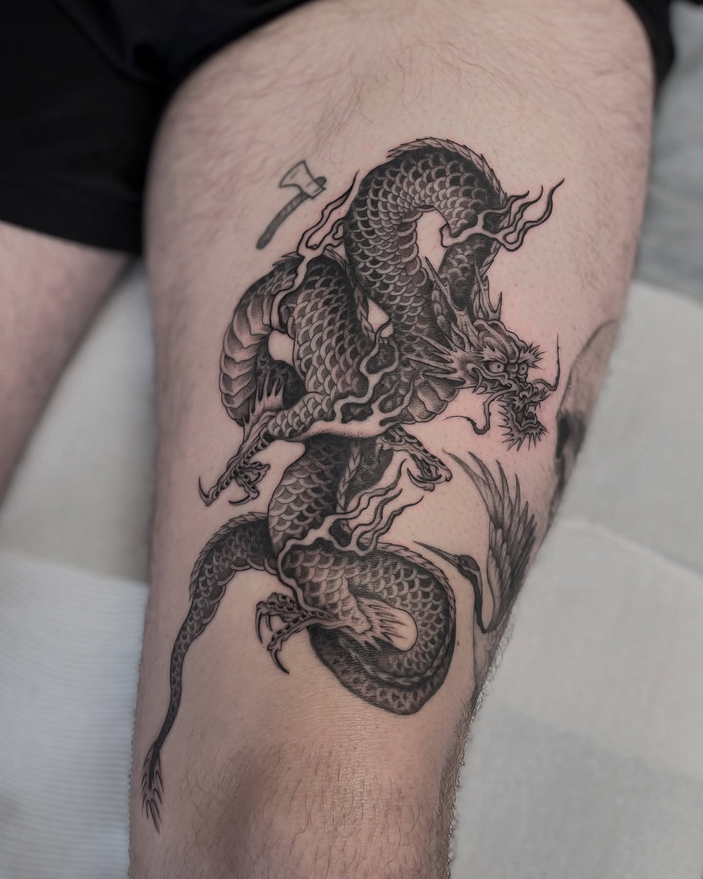 Dragon realism tattoo on the thigh by Gold Coast Tattoo Artist, Gold Coast, Queensland