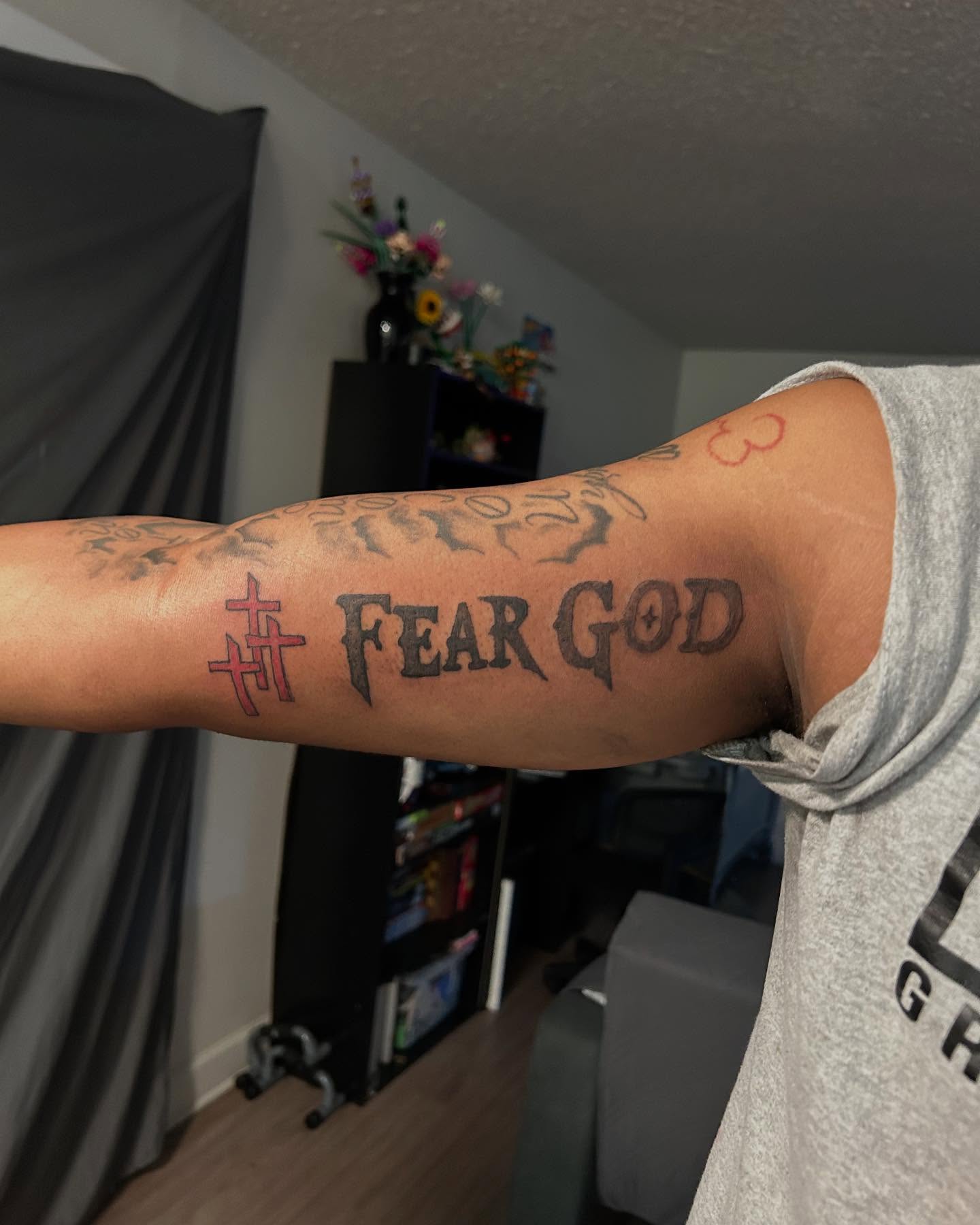 Fear god lettering script tattoo on the forearm by 702tattoo💉🩸
