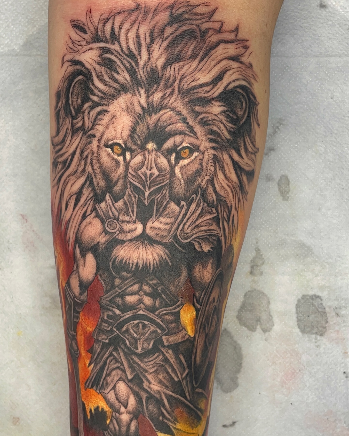Lion warrior realism tattoo on the forearm by Noriega Josué