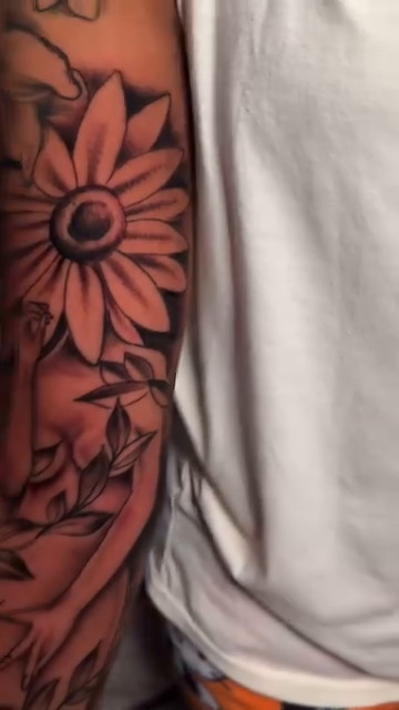 Sunflower and leaves realism tattoo by Artist Clayco rikky