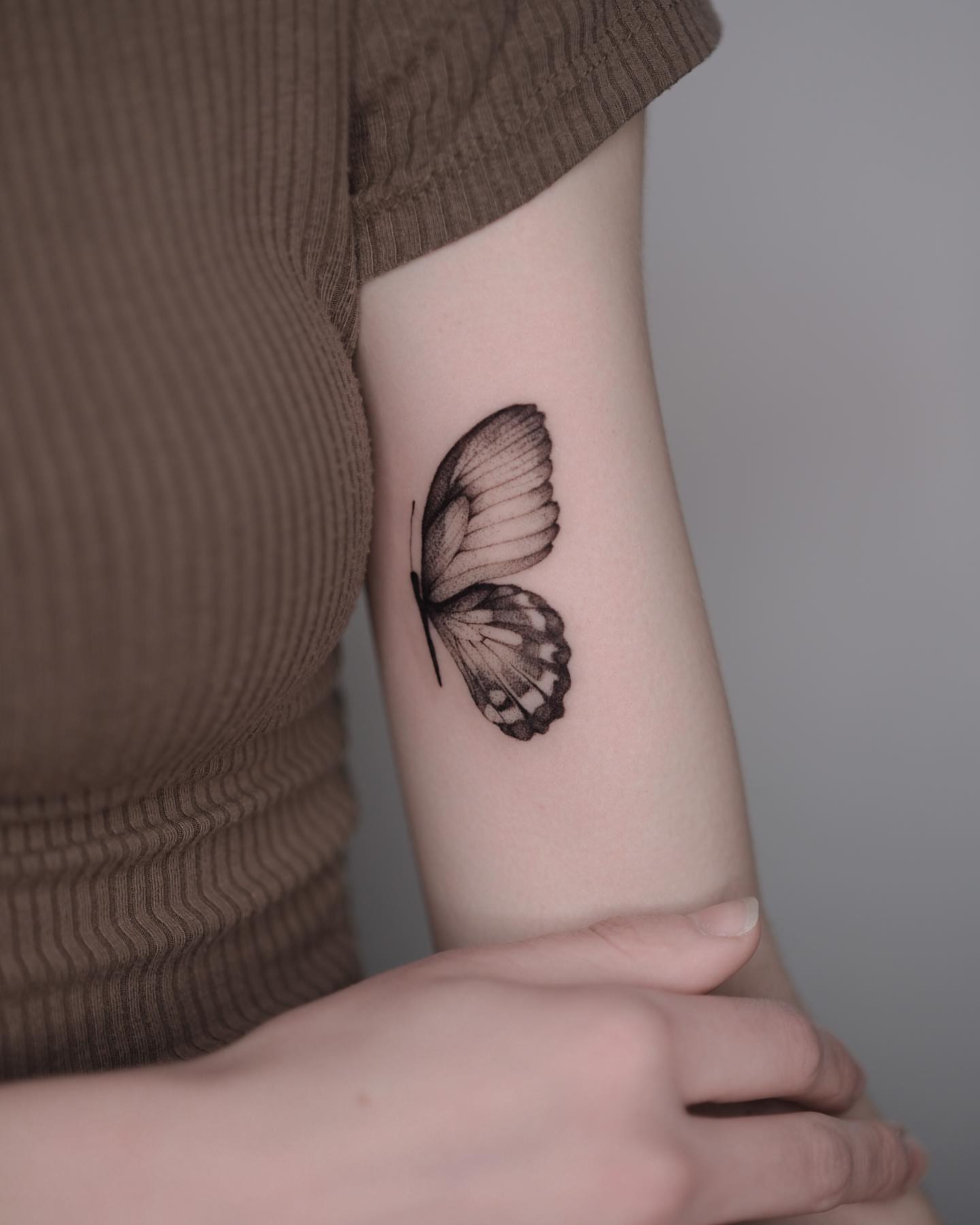 Butterfly dotwork tattoo on the forearm by Tattoo artist in Boston