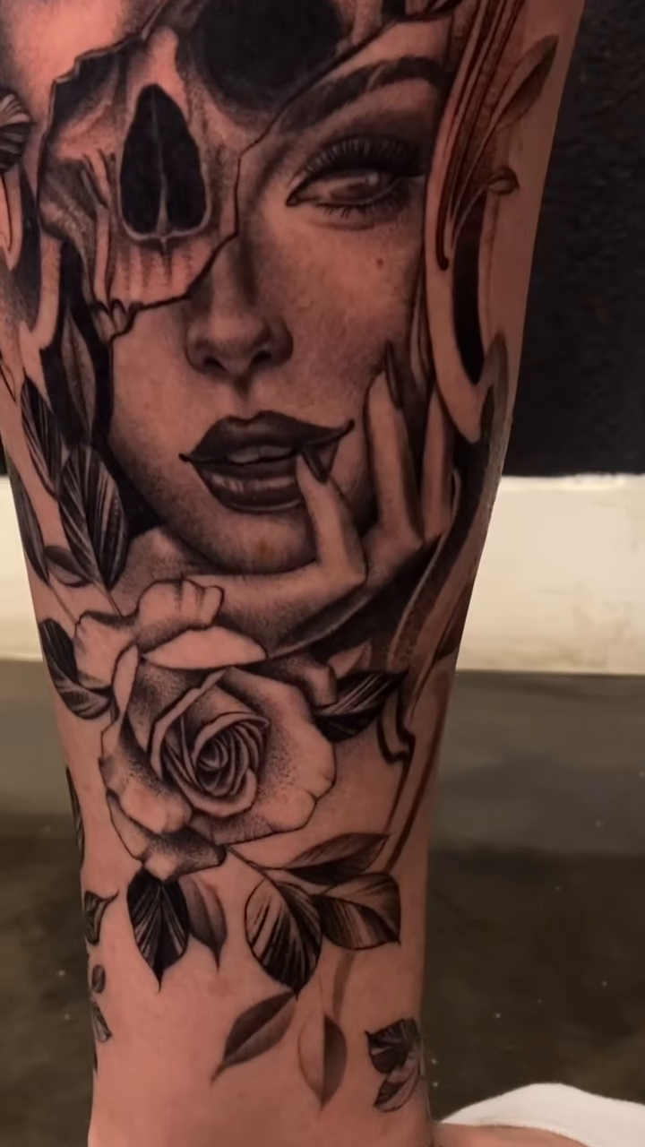 Skull and woman with roses dark realism tattoo by Las Vegas tattoo Artist