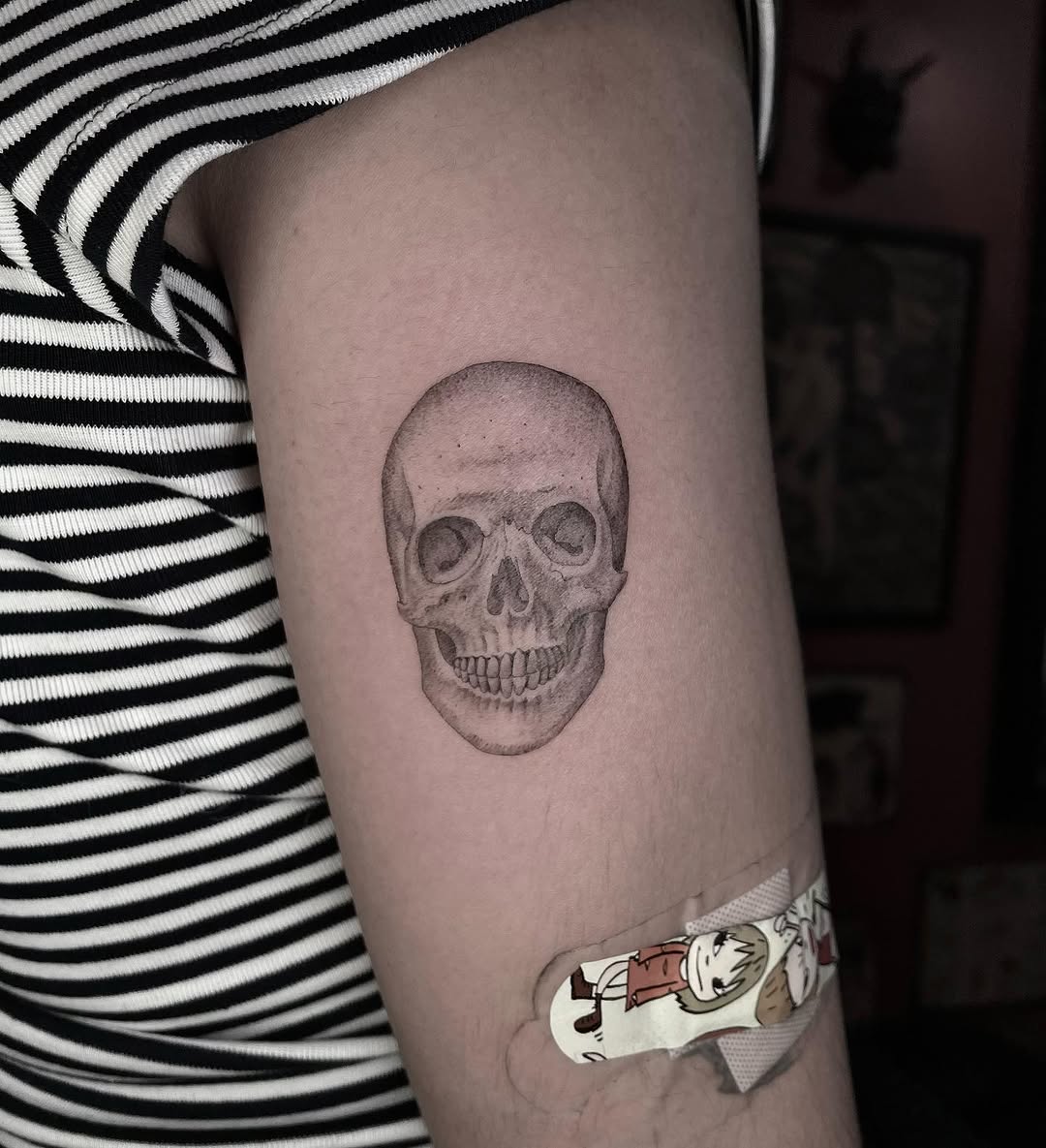 Skull realism tattoo on the forearm by Jesus A.