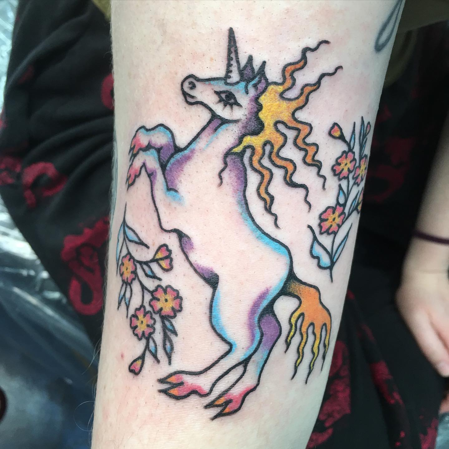 Unicorn new school tattoo on the forearm by Abbey Martin, Nashville, Tennessee