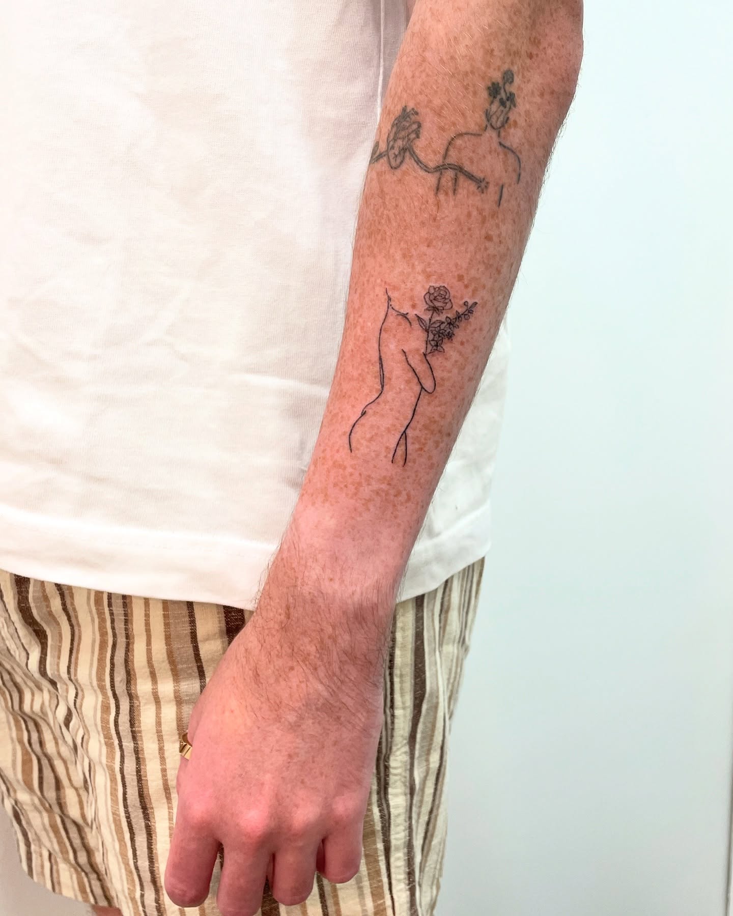 Tattoo by @titsfortatt — fine_line, minimalist