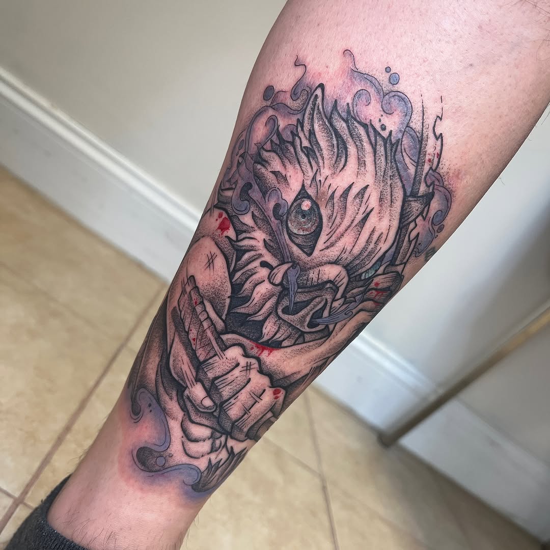 Demon face with hands anime tattoo on the forearm by Koryn Donnelly