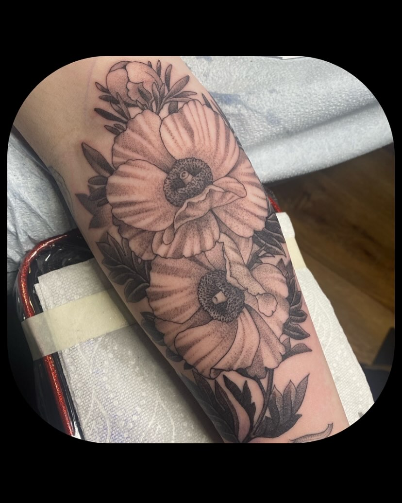 Poppy flowers black and grey tattoo on the forearm by ๐ญ๐๐ ๐ฎ๐๐๐๐๐, Berkeley, California