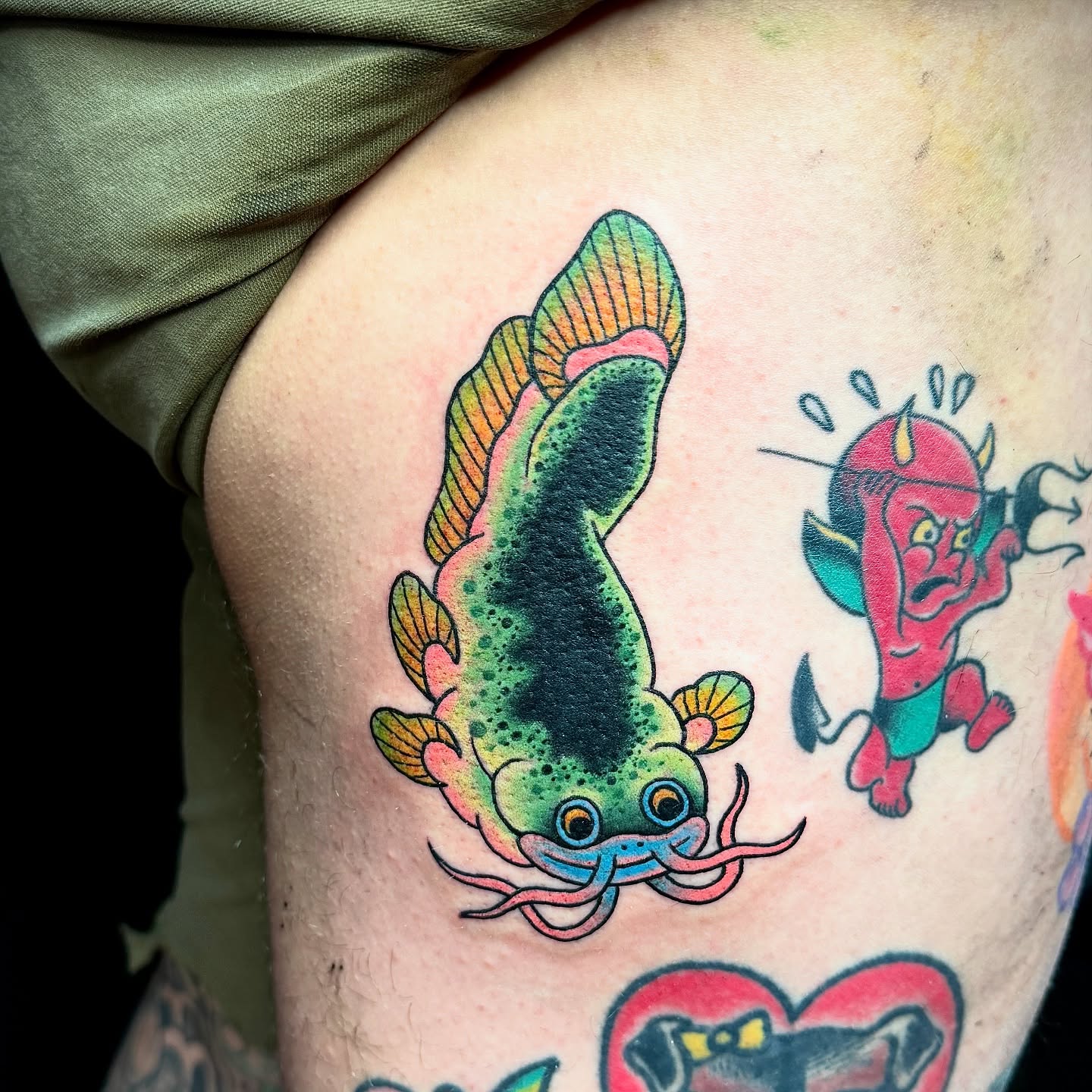 Catfish American traditional tattoo on the thigh by Derek Cilla, Bethlehem, Pennsylvania