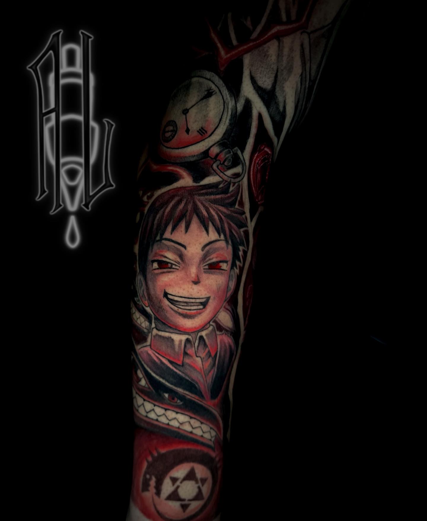 Anime character anime tattoo on the forearm by Andrew Luce