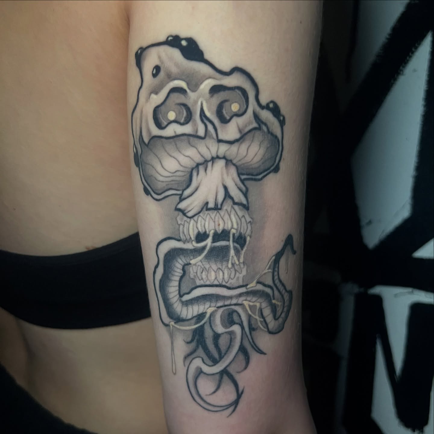 Skull dark realism tattoo on the forearm by Brittney