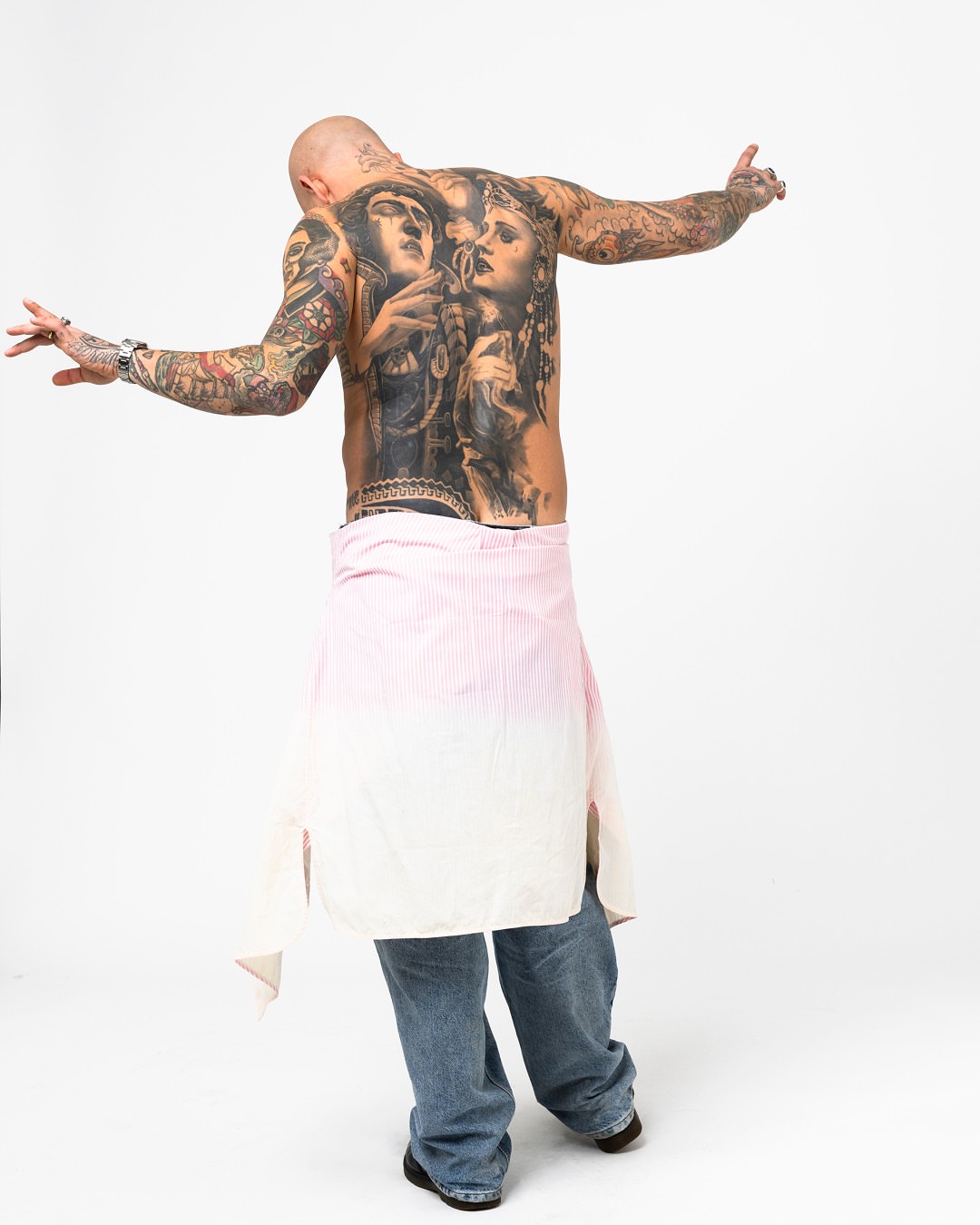 Two figures American traditional tattoo on the back by Massimiliano pennella