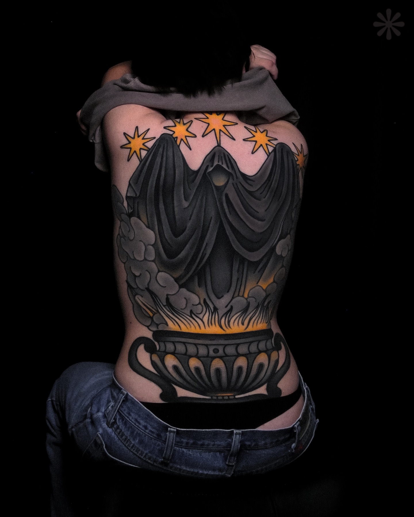 Ghostly figure with stars dark realism tattoo on the back by Last Year Of Disaster
