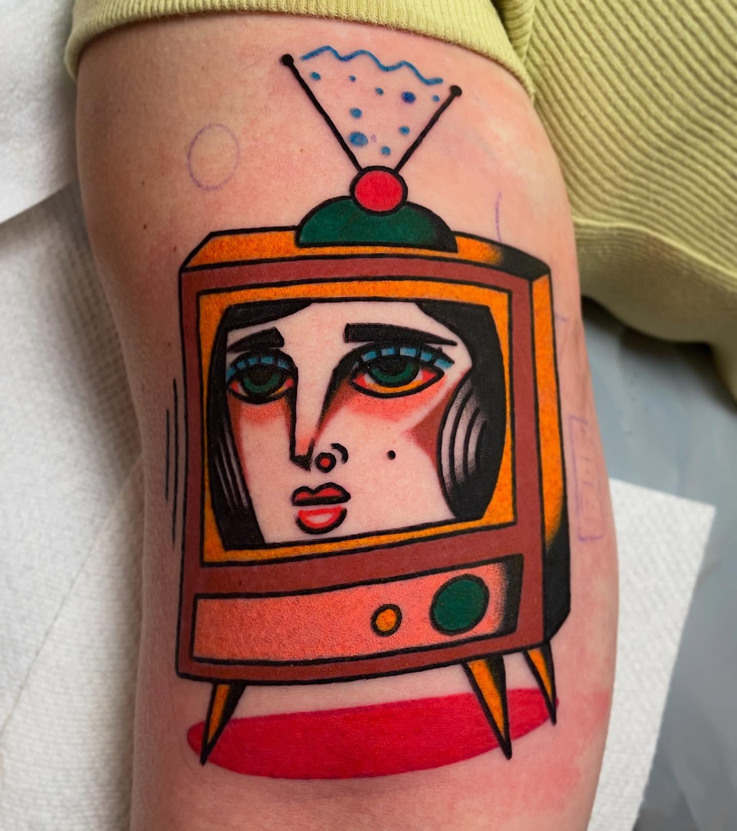 Television geometric tattoo on the forearm by Jacob, Marion, Illinois
