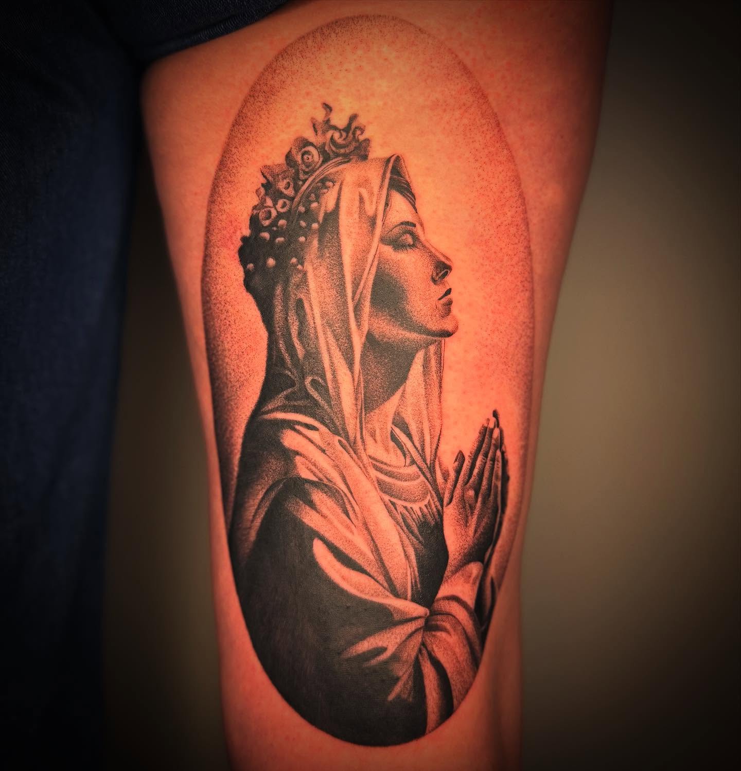 Religious figure realism tattoo on the thigh by Jacob Deirfield, Circleville, Ohio