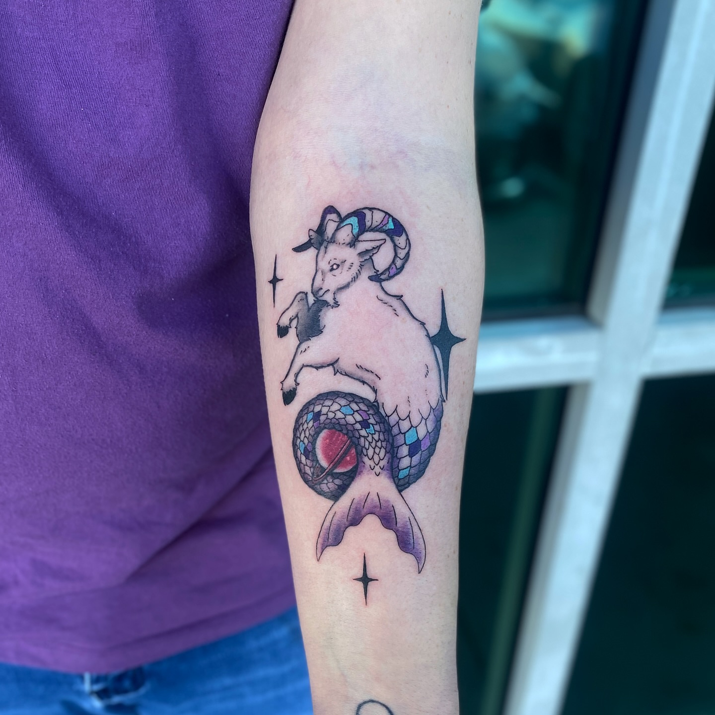 Ram and snake American traditional tattoo on the forearm by Elliot Jaye Valentine