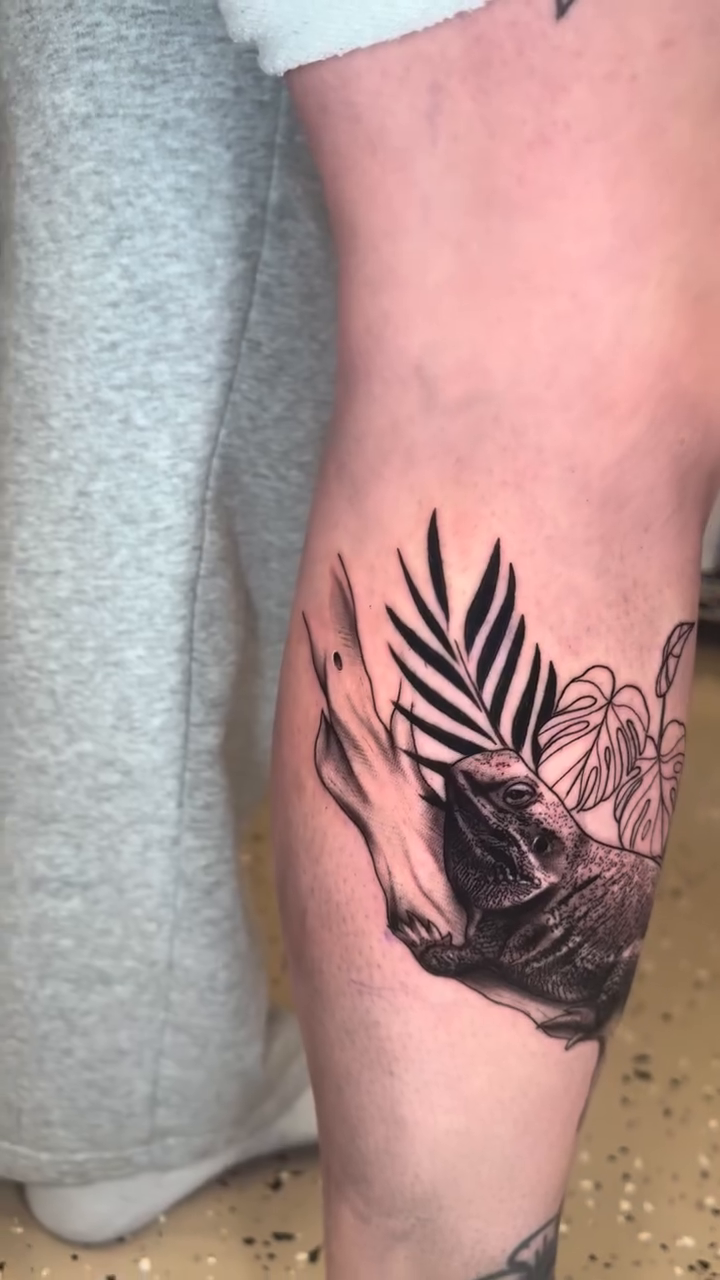 Lizard with plants realism tattoo by Ian Chancellor, Leighton Buzzard, England