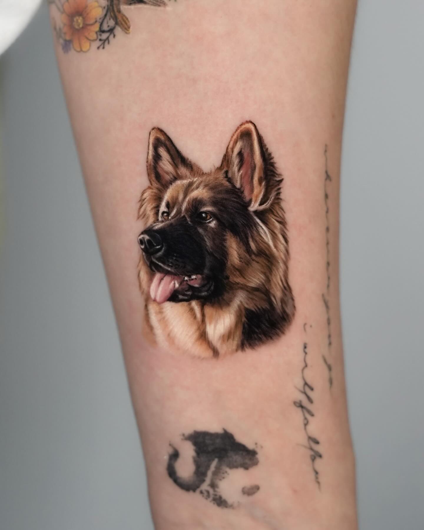 German shepherd realism tattoo on the forearm by Hoze