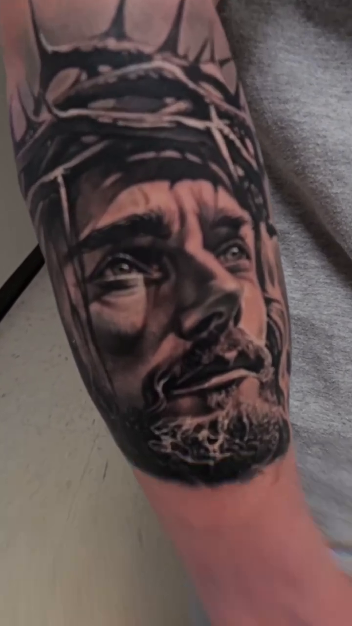 Jesus Christ portrait realism tattoo by Tyler Malek