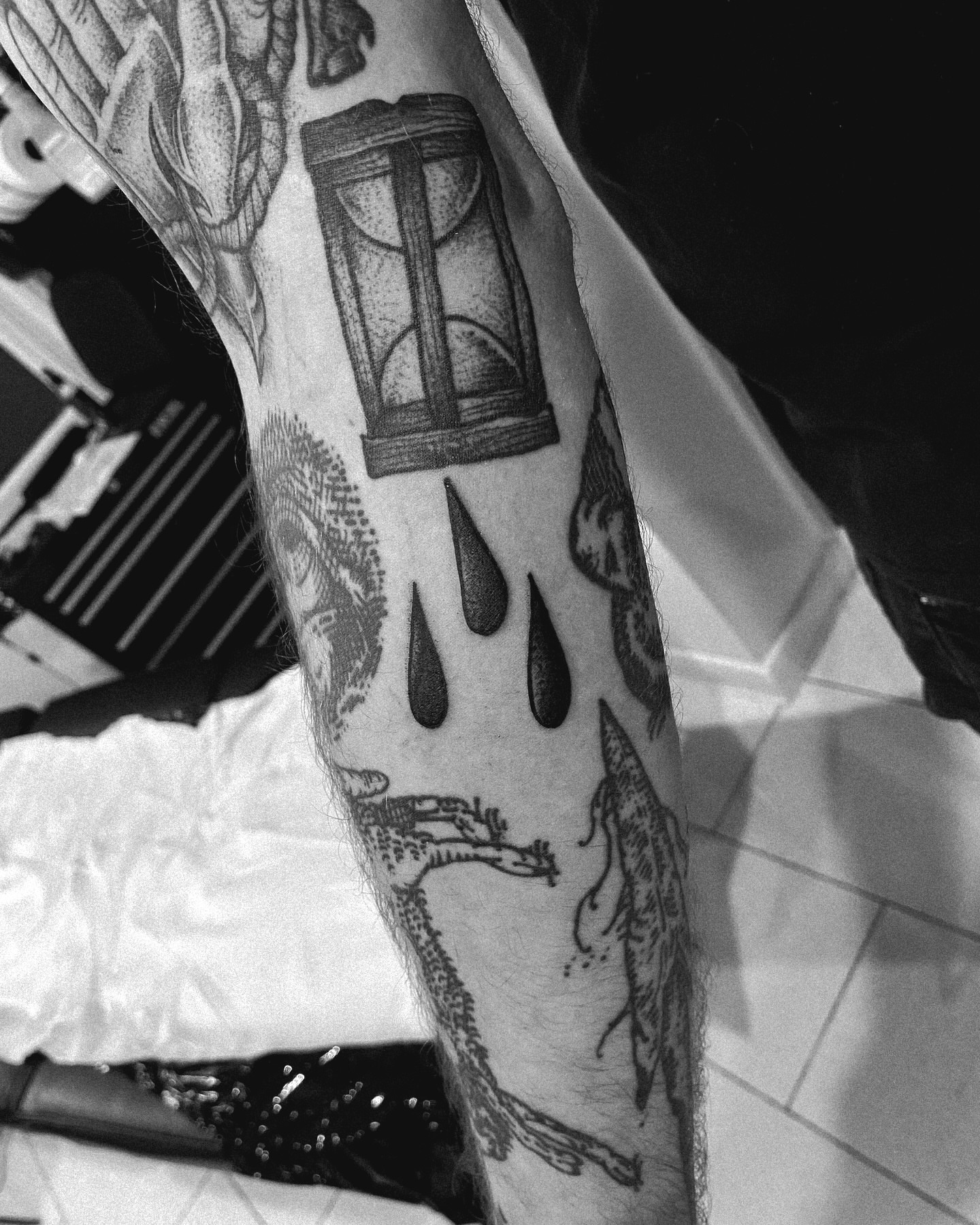 Tattoo by @chrisdafacetattoo — black_and_grey
