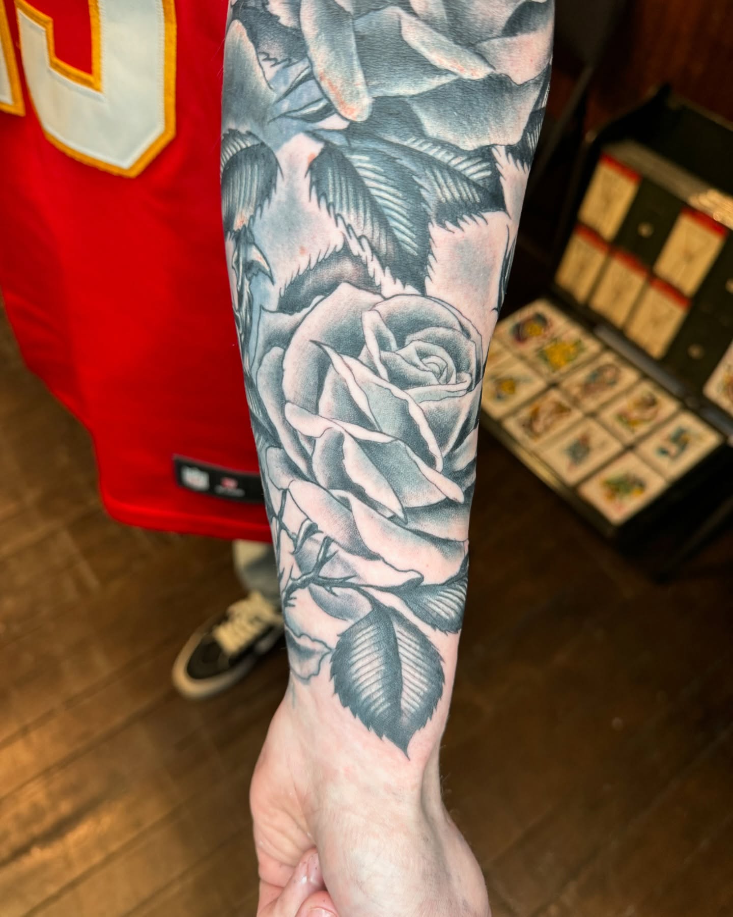 Rose black and grey tattoo on the forearm by Marc Brotemarkle