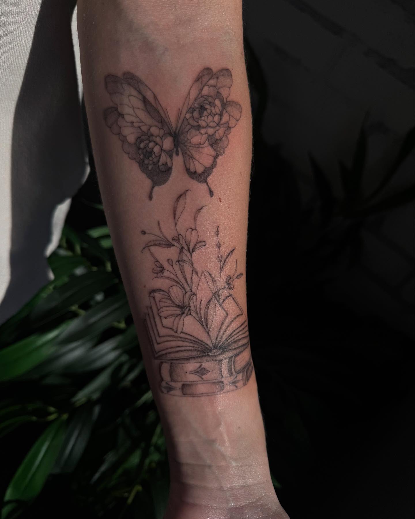 Butterfly and flowers realism tattoo on the forearm by ❀ Moo, Mount Laurel, New Jersey