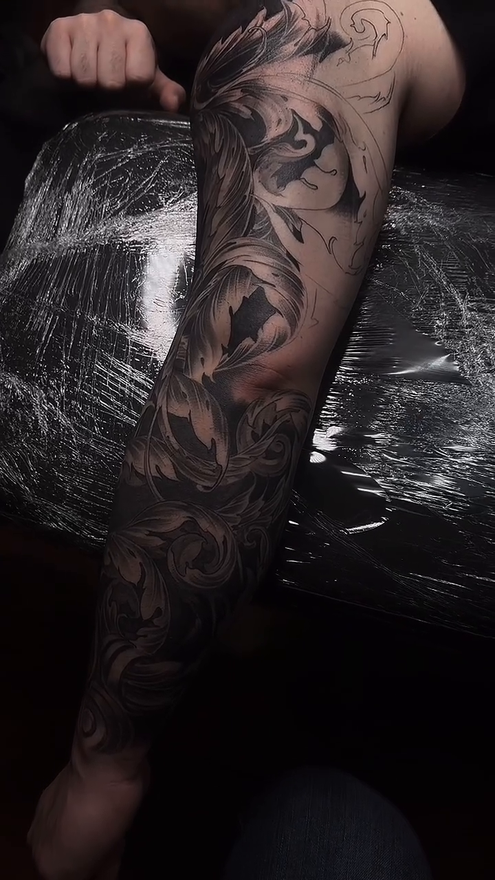 Floral sleeve realism tattoo by TATTOOS by Elvis Ramos - California tattoo