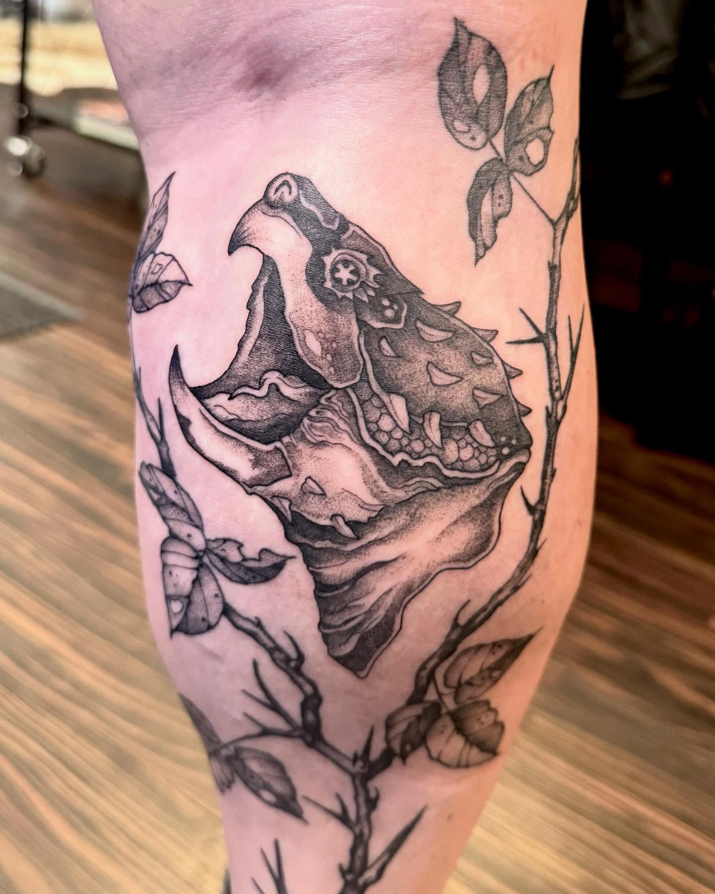 Turtle and foliage realism tattoo on the forearm by Katie Stacy