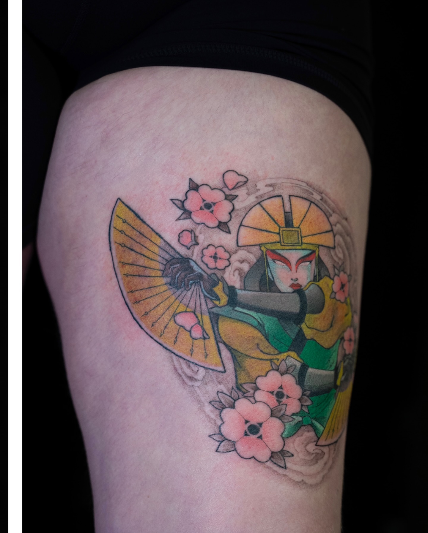 Geisha with fan japanese irezumi tattoo on the thigh by Chris Estrada