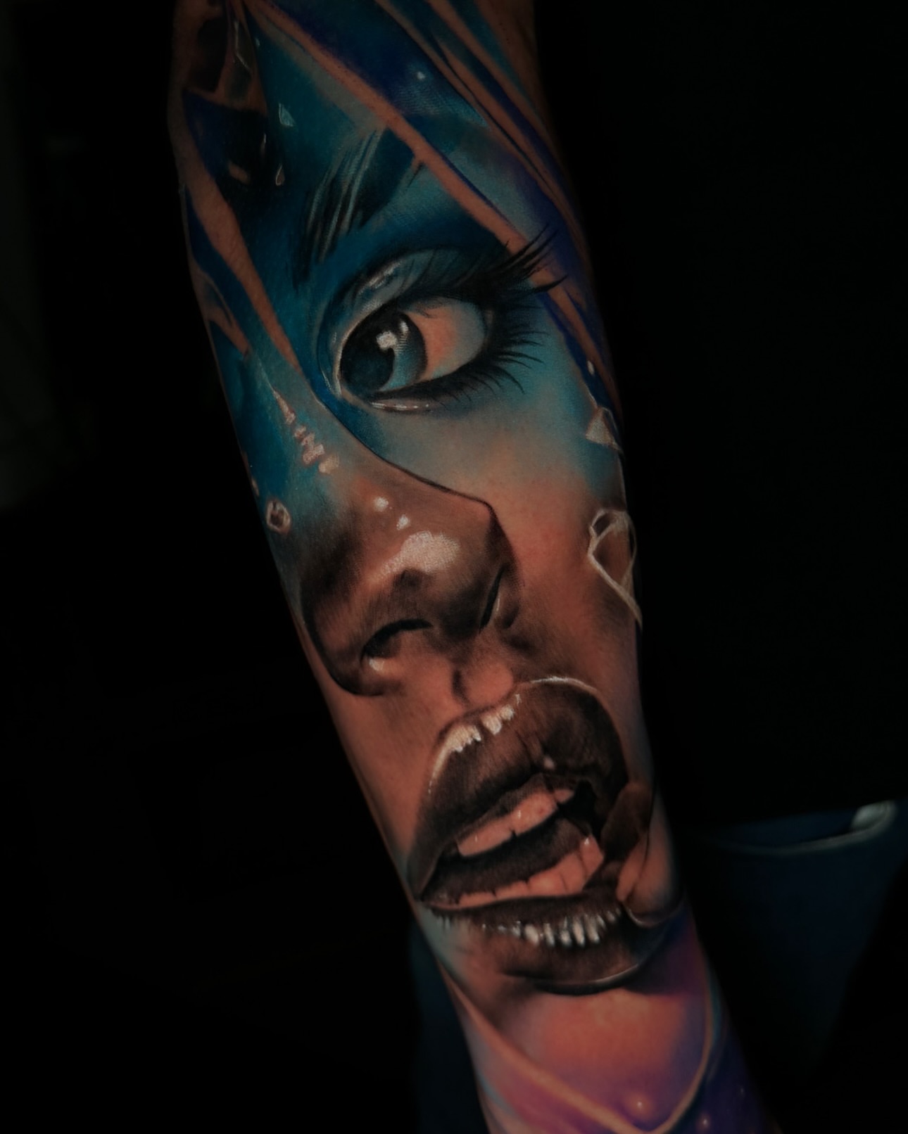 Face realism tattoo on the forearm by Juan Pablo Molina