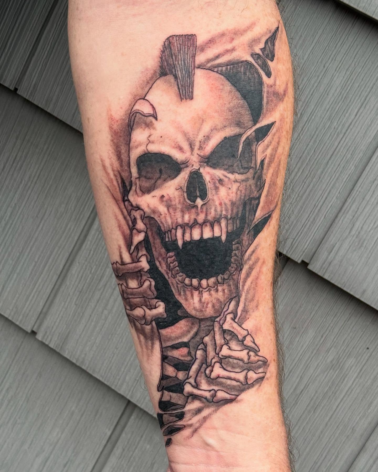 Skull realism tattoo on the forearm by Iconic Ink, Millbury, Massachusetts